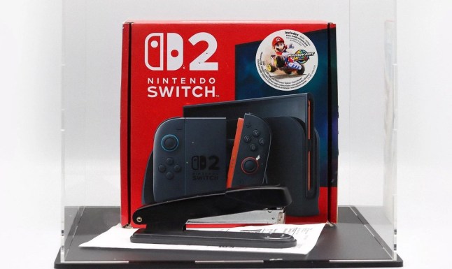 Nintendo Switch 2 box and black stapler in see through case